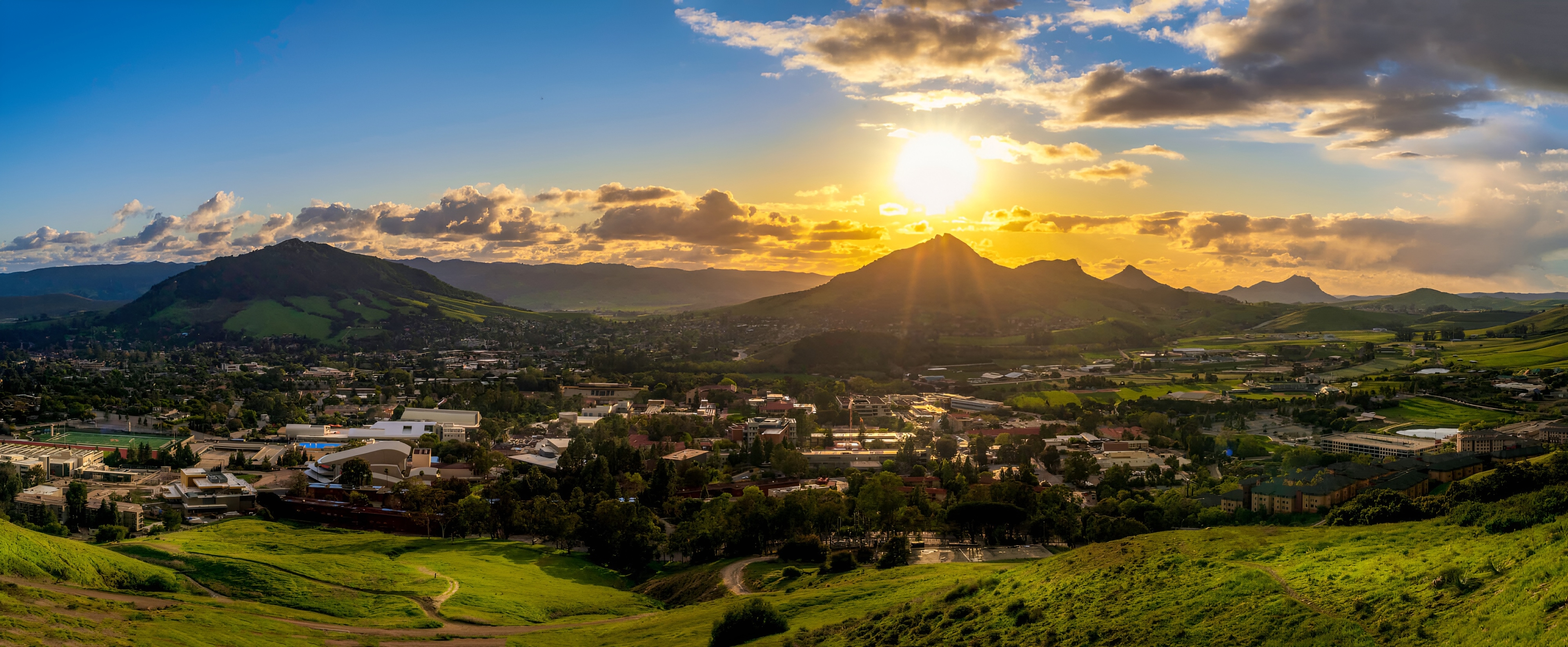 Aerial view of Cal Poly SLO and Bishop Peak at sunset